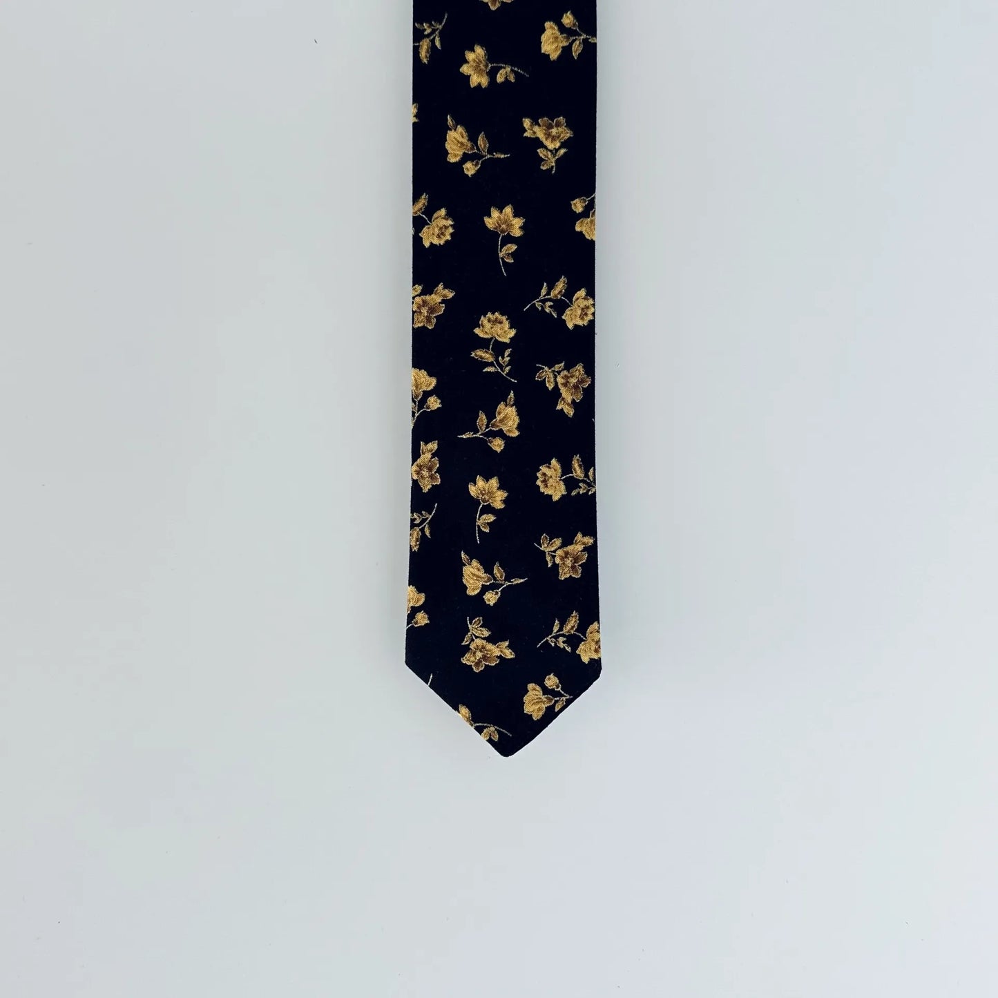 Elegant black tie with gold floral pattern