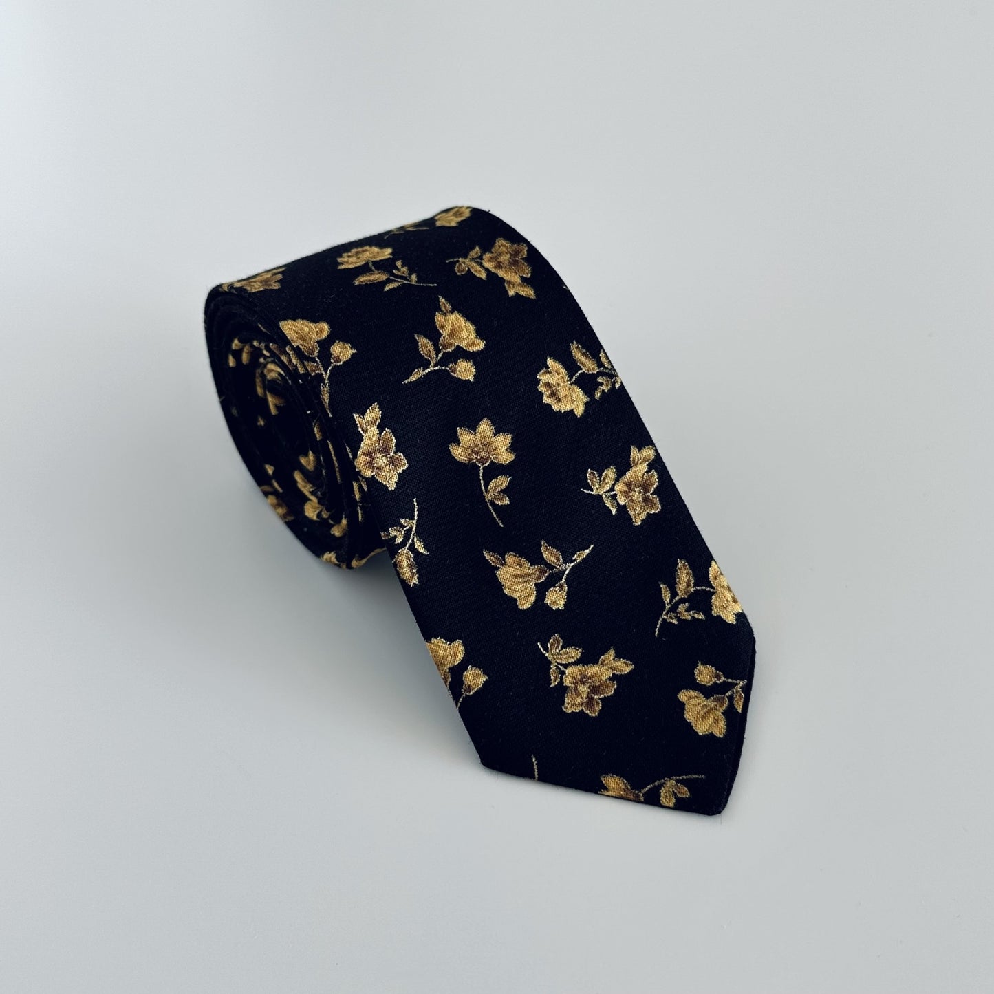 Handmade black cotton satin tie with gold floral